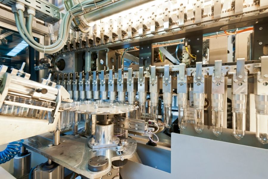 Injeção de pré-formas de PET